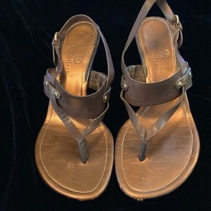 Brown leather with copper footbed sandals.